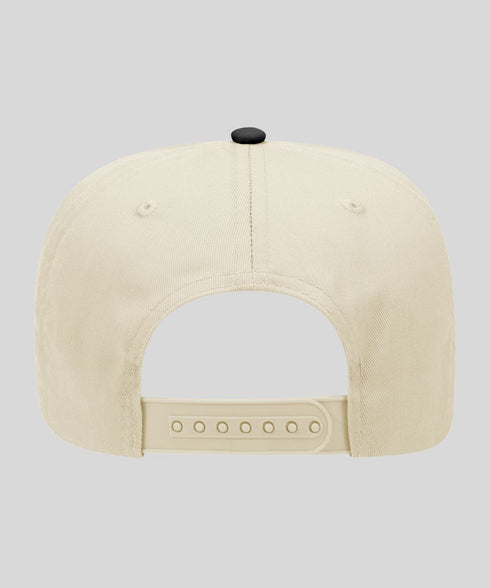Beige cap with a black button on a light gray background